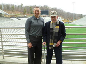 Photo of Mr. Hickok with Coach Monken
